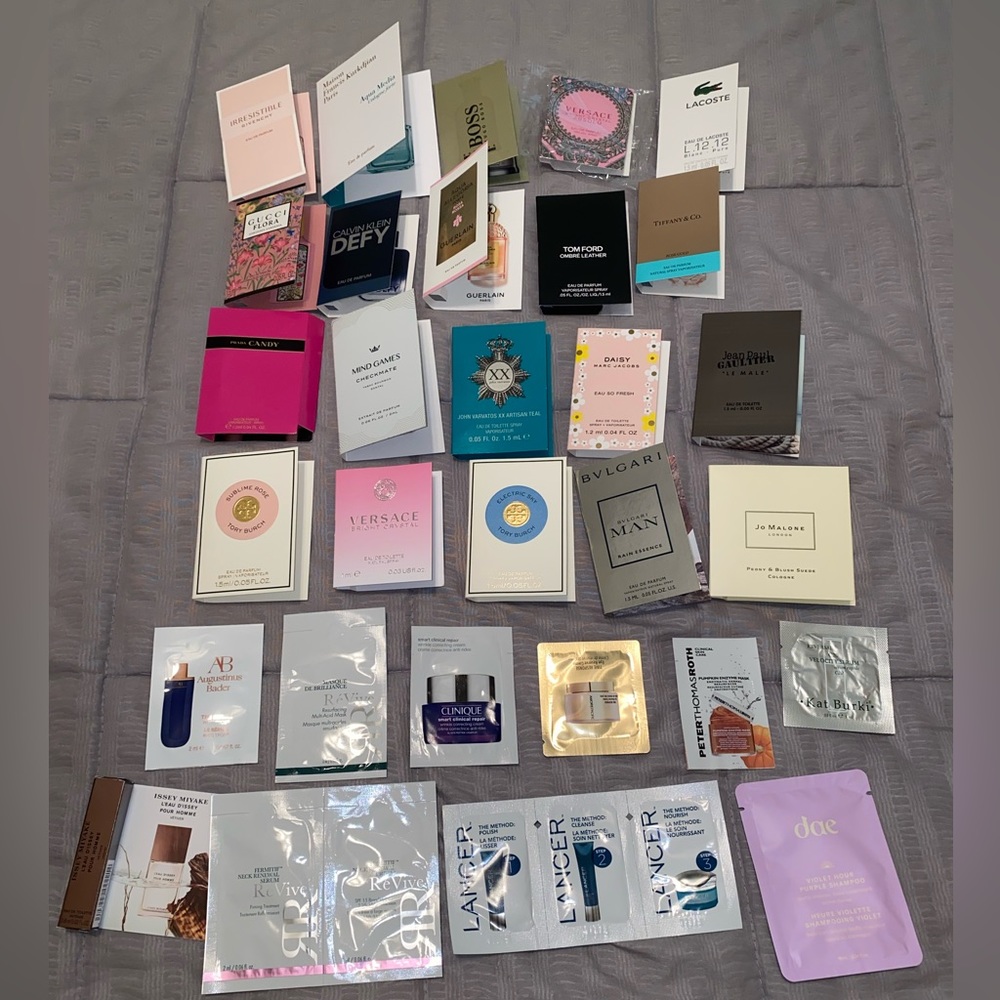 Brand new over 60 prestige beauty/skincare/perfume items plus free bag